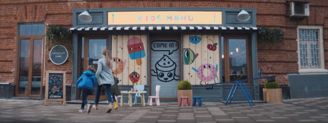 Video Reference: public space, mural, facade, recreation, street art, street, window, building, advertising, Person