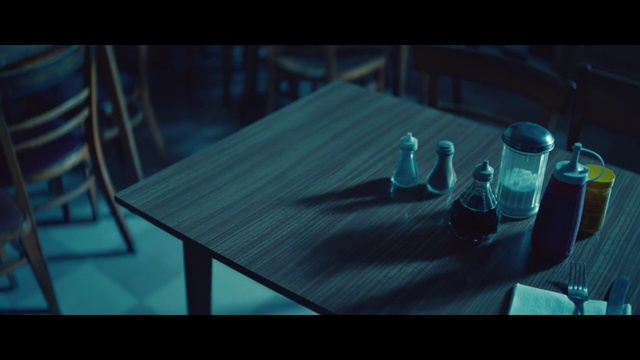 Video Reference: Blue, Turquoise, Light, Table, Snapshot, Design, Transparent material, Glass, Screenshot, Photography, Indoor, Sitting, Computer, Wooden, Laptop, Keyboard, Set, Desk, Wine, White, Room, Red, Man, Standing, Dining table