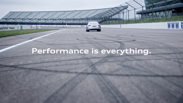 Video Reference: car, asphalt, infrastructure, race track, mode of transport, structure, road, line, vehicle, lane