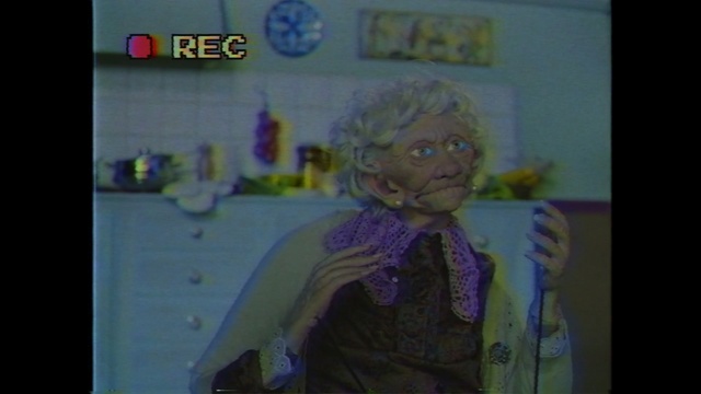 Video Reference: Purple, Forehead, Human, Portrait, Organism, Fun, Photo caption, Mouth, Fictional character, Adaptation, Person