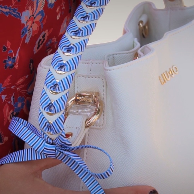 Video Reference: , Indoor, Sitting, Table, Box, Man, White, Different, Holding, Filled, Woman, Display, Plane, Room, Design