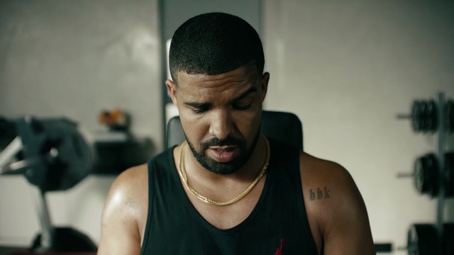 Video Reference: audio, chin, audio equipment, muscle, arm, neck, physical fitness, facial hair, chest, electronic device, Person
