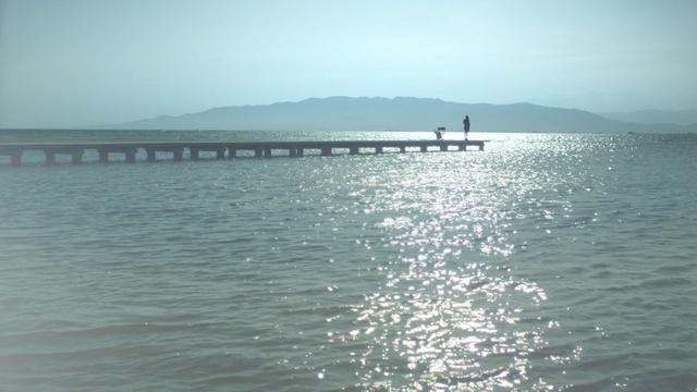 Video Reference: Body of water, Water, Sea, Water resources, Horizon, Ocean, Pier, Calm, Fixed link, Waterway