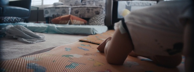 Video Reference: mammal, sitting, leg, human body, hand, floor, girl, flooring