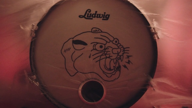 Video Reference: eye, mouth, organ, arm, drumhead, flesh, finger, abdomen, font, tattoo, Person