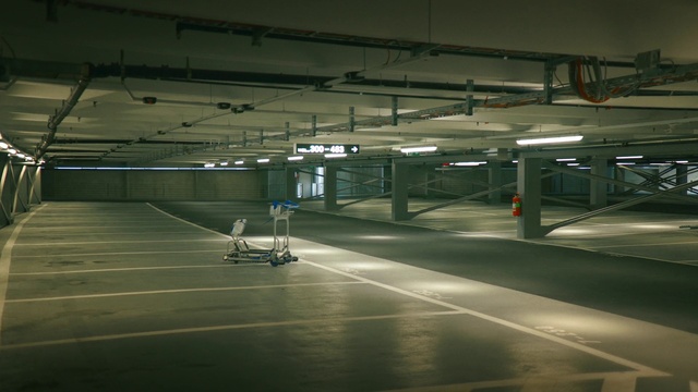 Video Reference: Parking lot, Public space, Parking, City, Building, Hangar, Asphalt