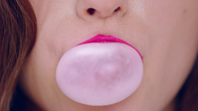 Video Reference: Lip, Face, Chewing gum, Cheek, Nose, Skin, Pink, Chin, Mouth, Tongue