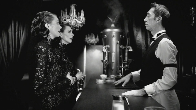 Video Reference: Film noir, Black-and-white, Gentleman, Monochrome, Headpiece, Monochrome photography, Movie, Gesture, Style, Person