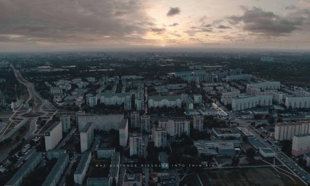 Video Reference: Aerial photography, Cityscape, Metropolitan area, Urban area, Metropolis, City, Birds-eye view, Sky, Human settlement, Daytime