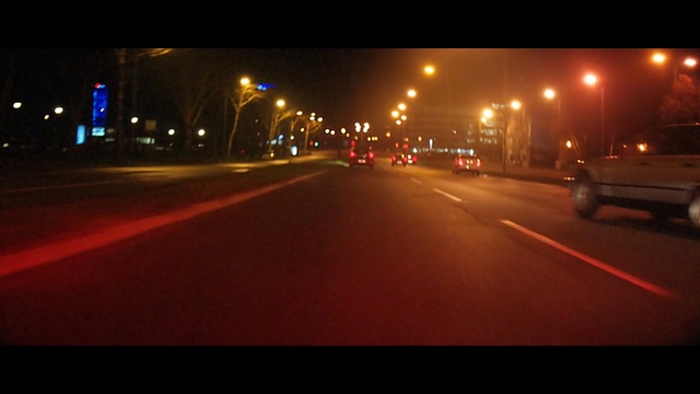 Video Reference: Night, Road, Street light, Lane, Light, Mode of transport, Lighting, Asphalt, Automotive lighting, Thoroughfare