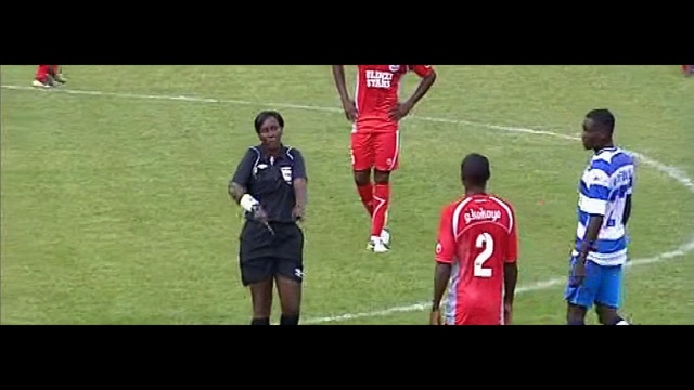 Video Reference: player, sport venue, football player, soccer player, football, games, grass, soccer specific stadium, ball, team, Person