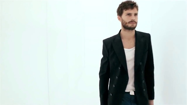 Video Reference: Suit, Clothing, Outerwear, Blazer, Formal wear, Jacket, Standing, Tuxedo, Fashion, Sleeve