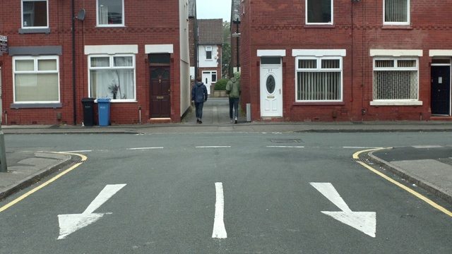 Video Reference: Lane, Road, Asphalt, Zebra crossing, Residential area, Infrastructure, Line, Road surface, Street, Pedestrian crossing