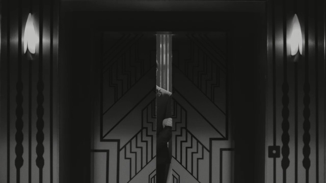 Video Reference: building, architecture, cinema, structure, city, theater, tower, sky, window, urban