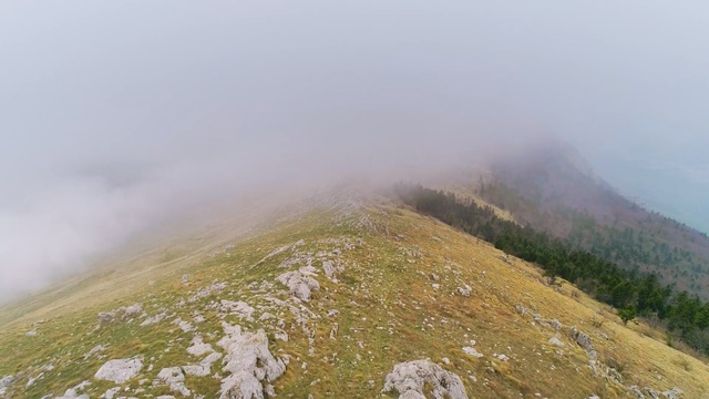 Video Reference: Mountainous landforms, Highland, Mountain, Atmospheric phenomenon, Fog, Ridge, Mist, Hill station, Sky, Hill