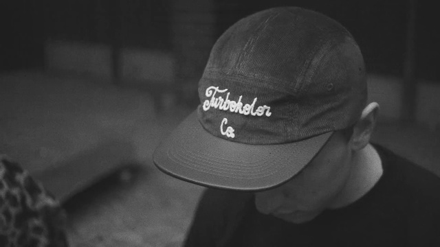 Video Reference: White, Black, Clothing, Cap, Baseball cap, Black-and-white, Headgear, Monochrome, Fashion accessory, Photography