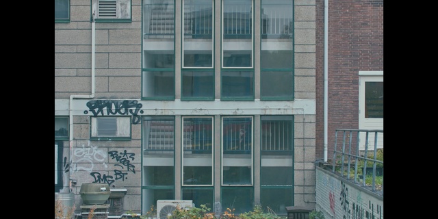 Video Reference: Property, Building, Real estate, Architecture, Urban area, Facade, Window, Commercial building, Apartment, Neighbourhood