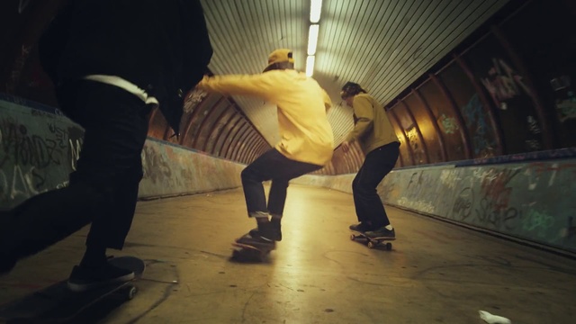 Video Reference: Yellow, Snapshot, Footwear, Dance, Recreation, Sport venue, Roller skating, Skateboard, Dancer, Skateboarding