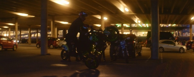 Video Reference: night, vehicle, street, city, car, crowd, evening, street light, recreation, traffic