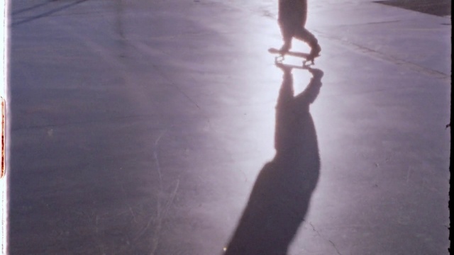Video Reference: Shadow, Leg, Floor, Ice skating, Human leg, Human body, Footwear, Hand, Recreation, Sunlight