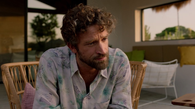 Video Reference: Hair, Facial hair, Beard, Chin, Human, Hairstyle, Forehead, Moustache, Sitting, Adaptation, Person, Indoor, Table, Man, Laptop, Window, Looking, Front, Food, Computer, Eating, Using, Shirt, Plate, Holding, Glass, Young, Woman, Restaurant, Room, Sandwich, White, Pizza, Human face, Clothing, Human beard, Screenshot