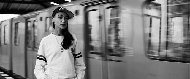 Video Reference: white, photograph, black, black and white, infrastructure, photography, snapshot, standing, street, monochrome photography, Person