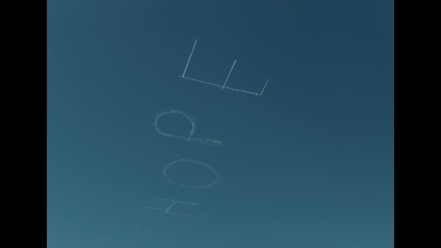 Video Reference: sky, blue, atmosphere, text, azure, line, daytime, font, air travel, computer wallpaper