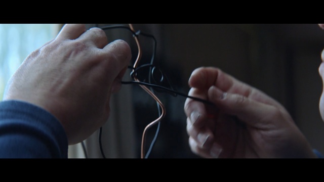 Video Reference: Audio equipment, Headphones, Ear, Technology, Close-up, Electronic device, Gadget, Wire, Hand, Cable