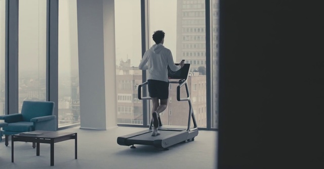 Video Reference: Standing, Treadmill, Exercise machine, Sitting, Furniture, Exercise equipment, Chair, Interior design