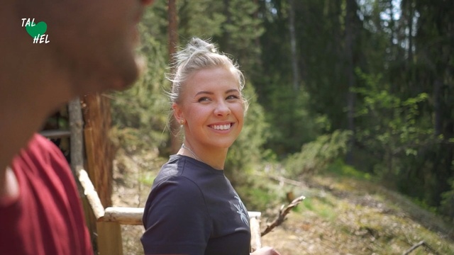 Video Reference: Hair, Blond, Smile, Adaptation, Fun, Tree, Leisure, Photography, Happy, Recreation, Person, Outdoor, Young, Grass, Standing, Boy, Smiling, Holding, Little, Looking, Man, Front, Shirt, Child, Green, Girl, Wearing, Woman, Forest, White, Human face, Clothing