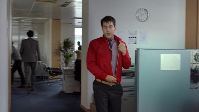 Video Reference: suit, standing, outerwear, design, exhibition, job, Person