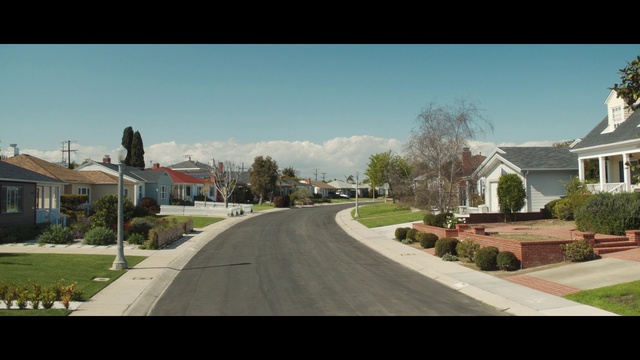 Video Reference: Residential area, Suburb, Neighbourhood, Road, Property, Town, Home, Asphalt, Human settlement, Daytime