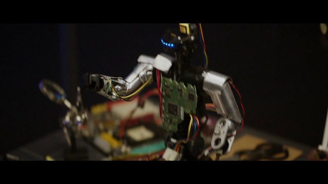 Video Reference: Robot, Figurine, Machine, Toy, Macro photography, Action figure, Technology, Photography, Space, Still life photography