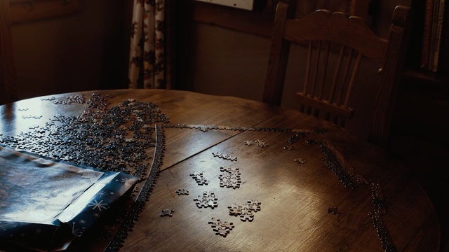 Video Reference: light, darkness, wood, table, flooring, shadow, Person