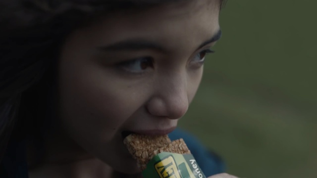 Video Reference: Nose, Lip, Chin, Eye, Close-up, Mouth, Child, Junk food, Smile, Brown hair, Person