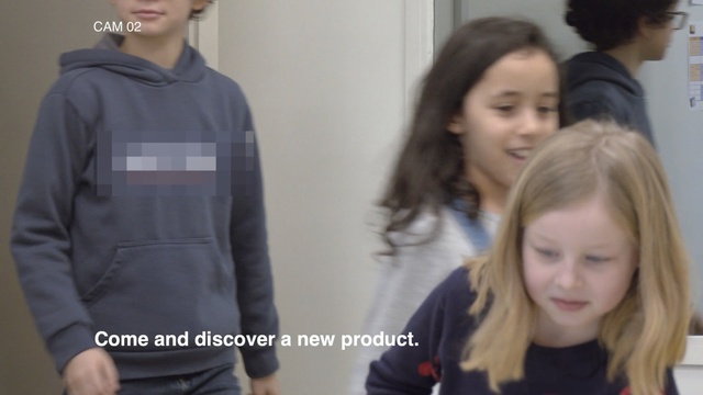 Video Reference: Outerwear, Uniform, T-shirt, Neck, Sleeve, Long hair, Top, Smile, Child, Person