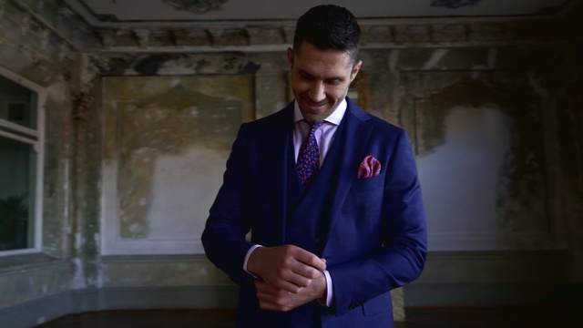 Video Reference: suit, blue, formal wear, gentleman, outerwear, tuxedo, necktie, white collar worker, speech, Person