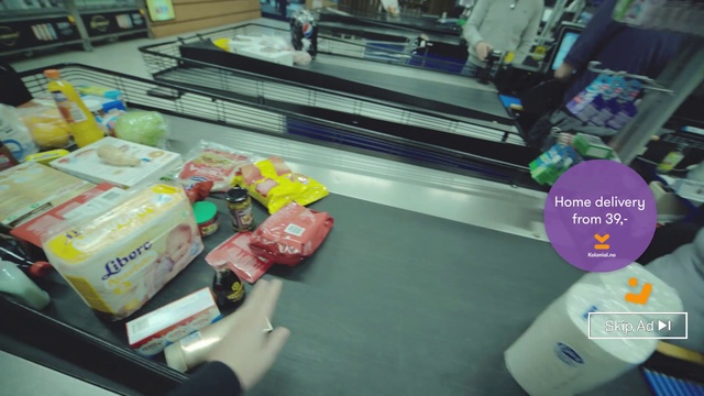 Video Reference: Product, Supermarket, Baggage, Grocery store, Convenience store, Vehicle, Indoor, Table, Desk, Office, Food, Computer, Cluttered, Sitting, Keyboard, Book, Sandwich, Laptop, Filled, Room, Woman, Game, Counter, Lunch, Donut, Man, Standing, Playing, Holding, Video, Cake, Desktop, Covered, Eating, People, Plate, Kitchen, Bed, Dog, Pizza, White, Phone, Stuffed, Group, Remote, Text, Worktable