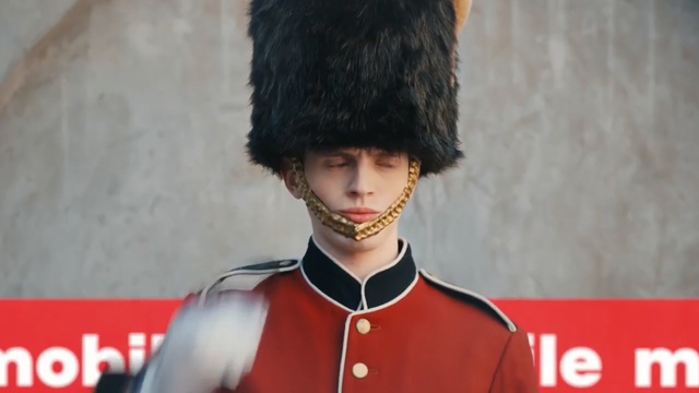 Video Reference: Bearskin, Clothing, Cap, Uniform, Headgear, Fur, Black hair, Smile