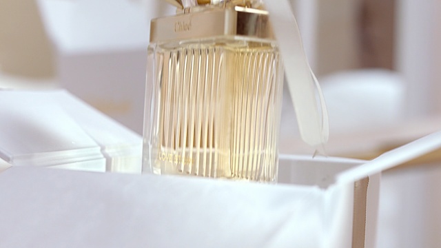 Video Reference: Perfume, Material property, Cosmetics, Room, Furniture, Beige