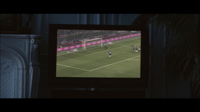 Video Reference: Sport venue, Stadium, Player, Football, Net, Display device, Grass, Line, Atmosphere, Multimedia