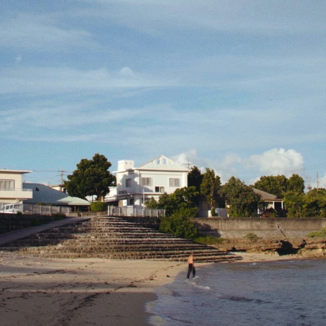 Video Reference: waterway, coast, shore, sky, sea, coastal and oceanic landforms, beach, bay, village, inlet, Person