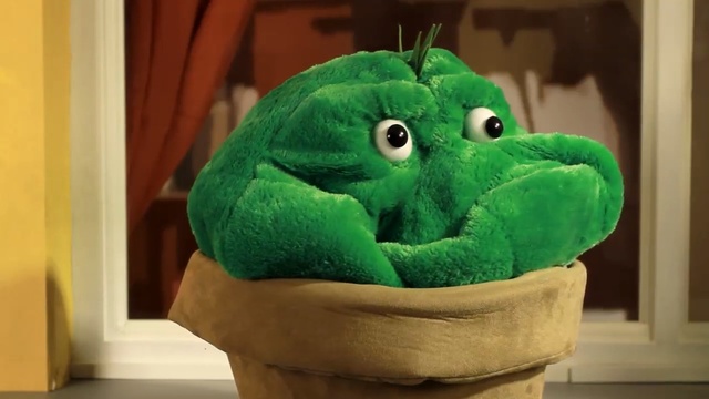 Video Reference: Green, Stuffed toy, Plush, Toy, Textile, Organism, Mouth, Animation
