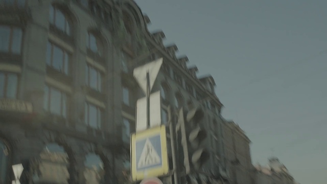 Video Reference: Atmospheric phenomenon, Daytime, Wall, Architecture, Building, Facade, Urban area, Sky, Neighbourhood, Metropolis