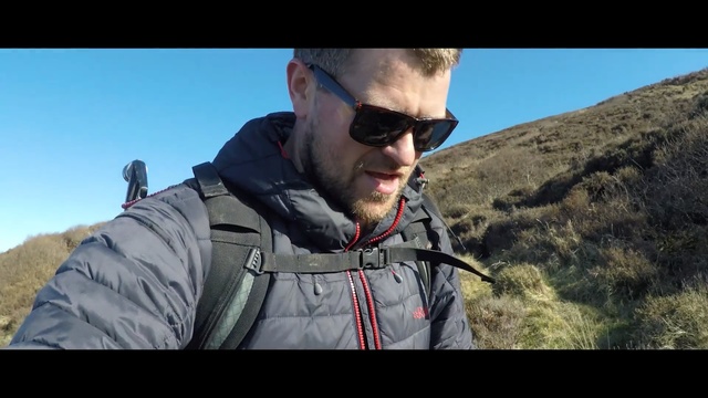 Video Reference: sunglasses, eyewear, vision care, wilderness, adventure, outdoor recreation, glasses, mountain, extreme sport, ridge, Person