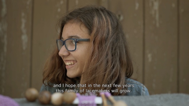 Video Reference: Hair, Face, Eyewear, Glasses, Chin, Forehead, Vision care, Smile, Brown hair, Photo caption, Person