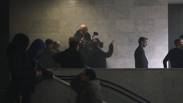 Video Reference: darkness, event, tourist attraction, night, crowd, conversation