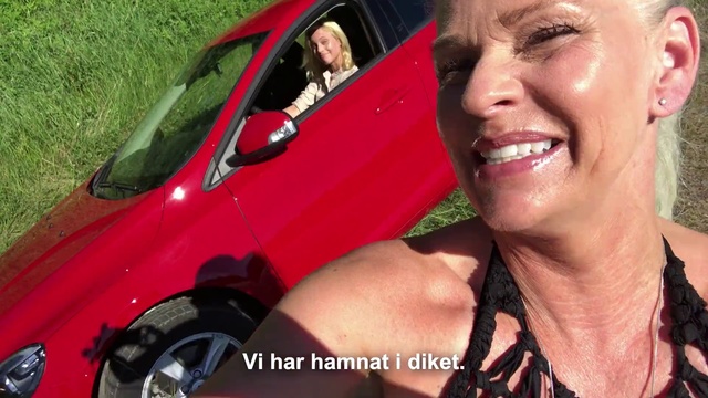 Video Reference: Vehicle door, Car, Vehicle, Photography, Compact car, Smile, Person, Outdoor, Grass, Smiling, Red, Posing, Woman, Man, Wearing, Front, Holding, Black, Camera, Truck, Talking, Standing, Large, Motorcycle, Driving, Young, Riding, White, Bus, Hot, Phone, Street, Parked, Mirror, Human face, Land vehicle, Clothing, Wheel