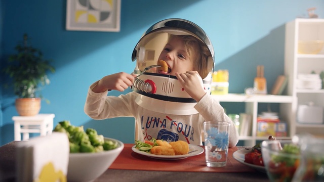 Video Reference: food, eating, fast food, meal, cuisine, child, brunch, toddler, breakfast, junk food, Person