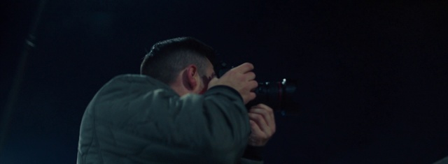 Video Reference: Photograph, Darkness, Head, Arm, Photography, Firearm, Human, Ear, Human body, Music